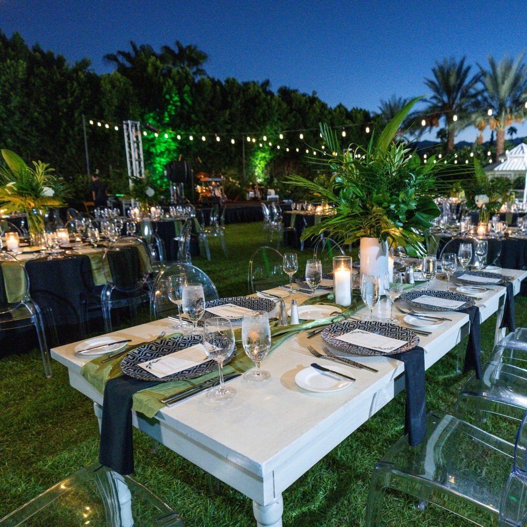 Luxury garden dinner with candlelit tables